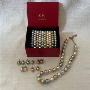 Kenneth Jay Lane multicolor pearl set of bracelets, earrings, and a necklace.